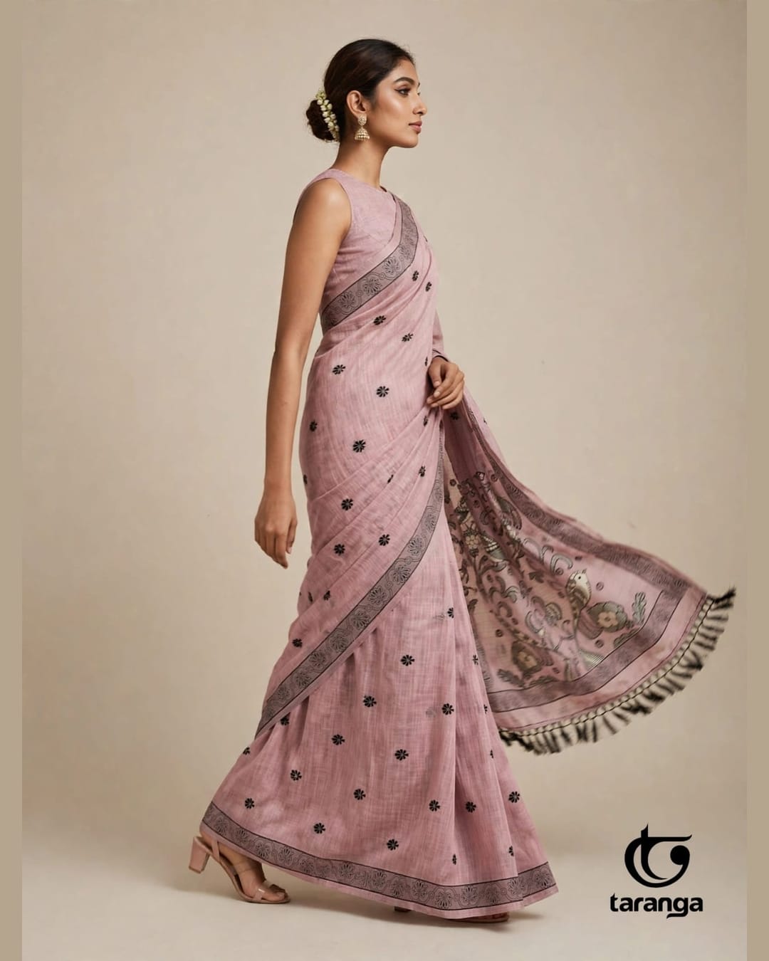 Pink saree with a flowing pallu
